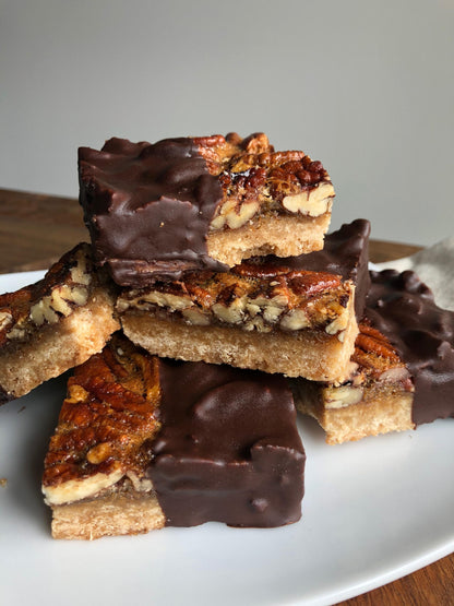 Dark chocolate dipped bourbon pecan bars
